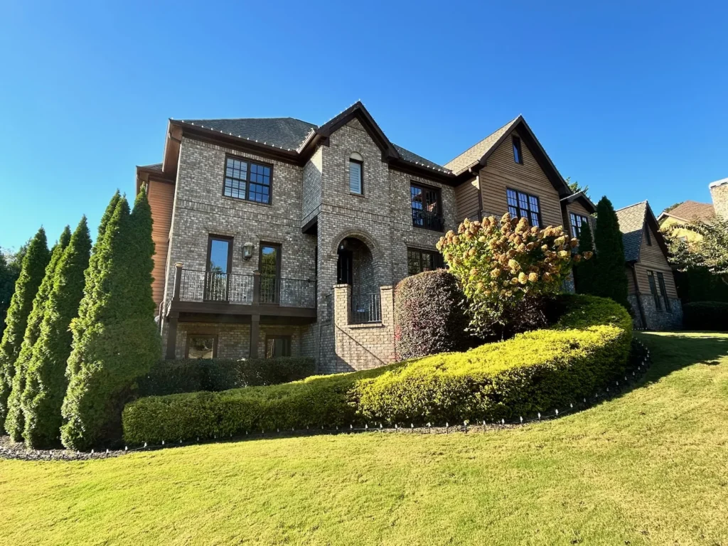 Daytime exterior view of a large residential property suitable for Christmas light design planning.