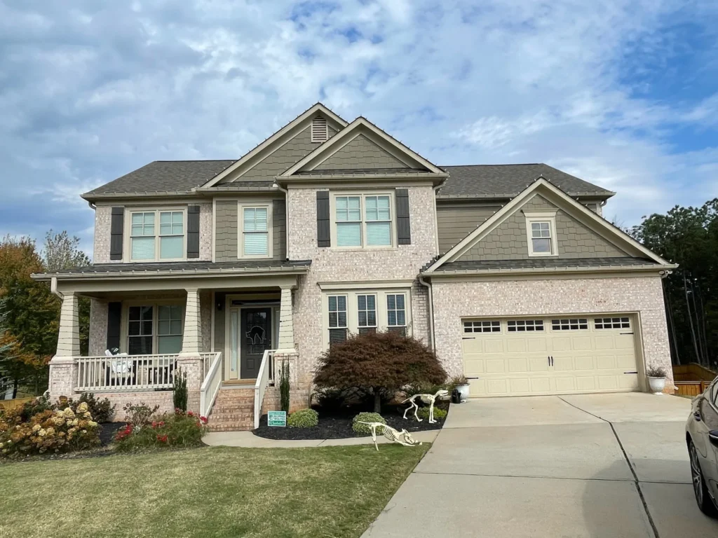 Daytime view of a two-story residential home for Christmas light installation planning.